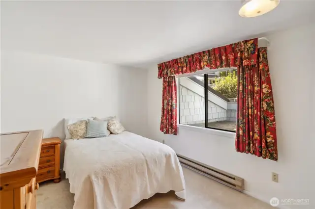 The second bedroom has a beautiful view.