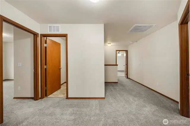 Enjoy added privacy with the primary bedroom situated on one side of the home, while the additional bedrooms are located on the opposite side.