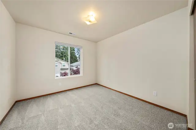 Spacious secondary bedrooms perfect for family, guests, or a home office.