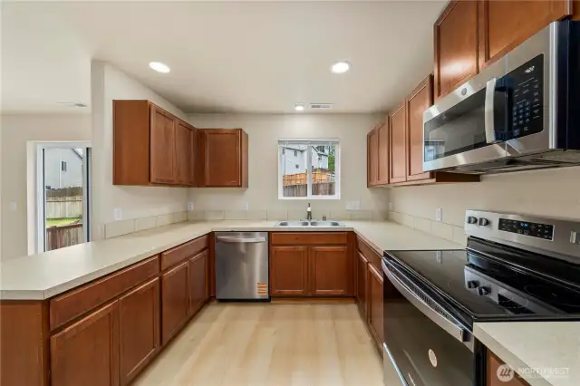 Enjoy the convenience of a brand-new oven and dishwasher, ready to elevate your everyday cooking experience.