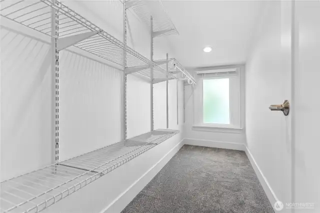 Walk in closet for Primary bedroom, upstairs.