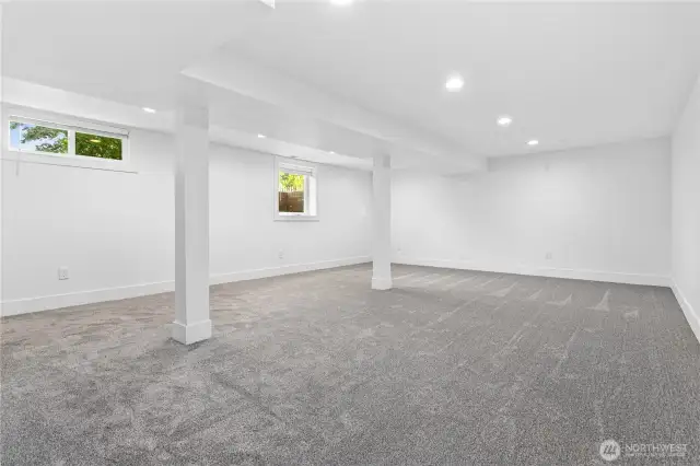 The basement has a large, open living space.