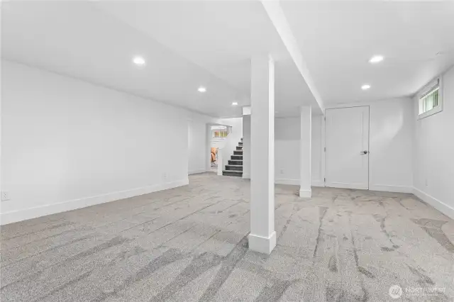 Plenty of room to play or relax.  Straight ahead there is a large storage space located behind the closed door.