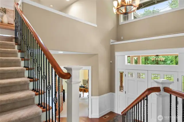 Double doors welcome you in. Slate flooring in the entry.