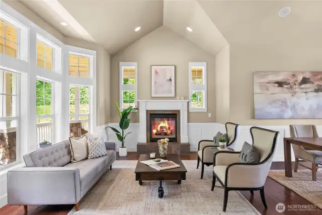 Living room with gas fireplace and cathedral ceilings make it such a welcoming place