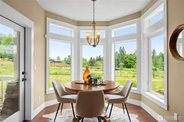 Casual eating area with door to covered porch.