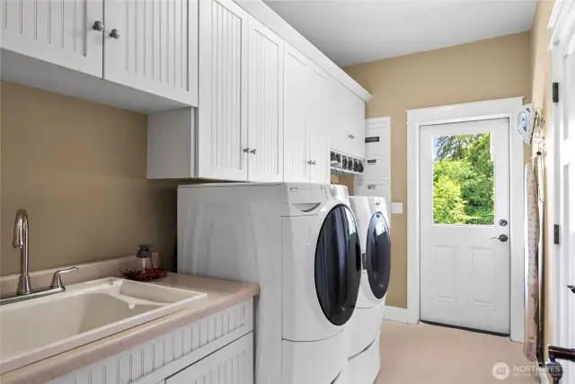Laundry rm has doors to the outside and garage