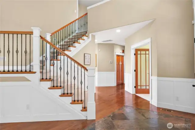 Beautiful staircase. Office is just off front entry.
