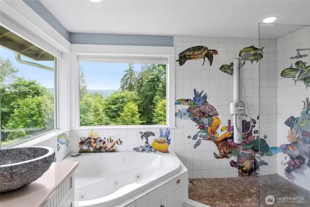 Primary bath with heated floors, custom tiles and view of the Cascade mountains