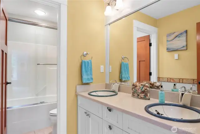 Hall bath with heated floors and double sinks