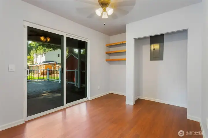 Second bedroom towards the back.  Could be used as an office with sliding door going out back.  Ceiling fan