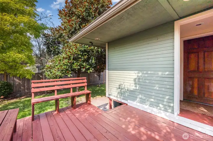 The back deck with built-in seating is the perfect spot to gather, relax, and soak in your private oasis.
