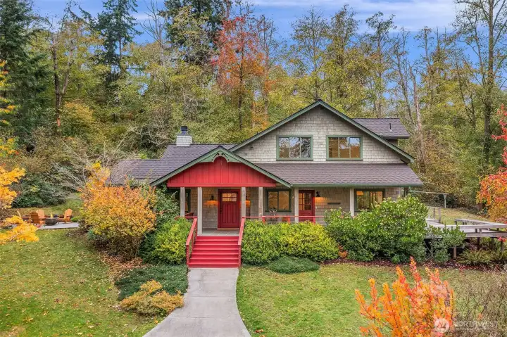 With a sense of warmth and welcome, the residence sits privately in the center of Vashon Island.