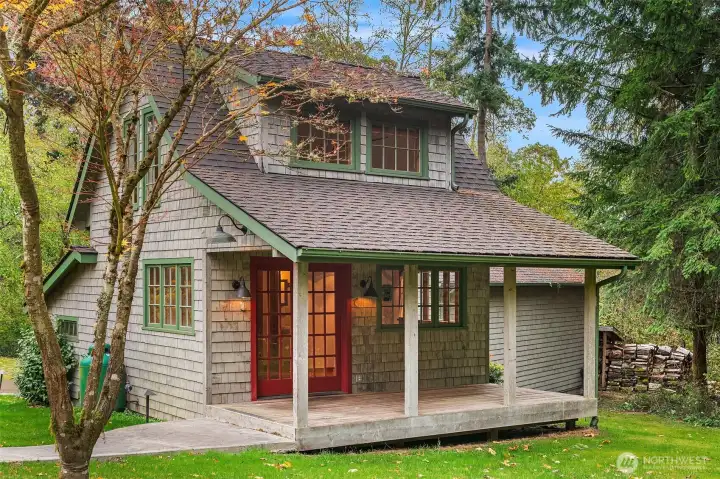 The cottage is as lovely as the home. Two stories, perfect for guests desiring privacy and independence, or use it as a cozy, office and hobby space.