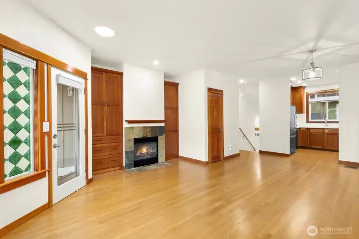 Large, open living space with gas fireplace.