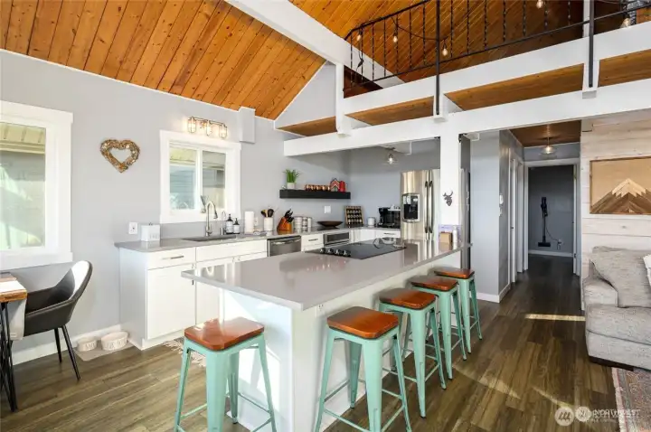 Updated kitchen with composite counters, and new refrigerator