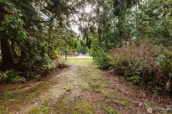 There's even a side drive to gain access to the back yard, if need be.