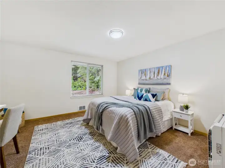 Large Bedroom with individual heating and air conditioning.