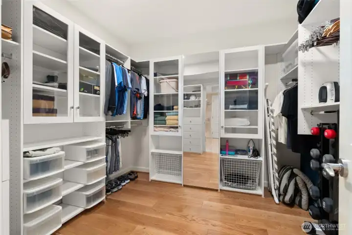 Primary walk-in closet Primary walk-in closet