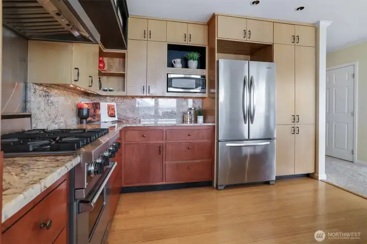 The kitchen has an efficient design and plenty of cabinet space.