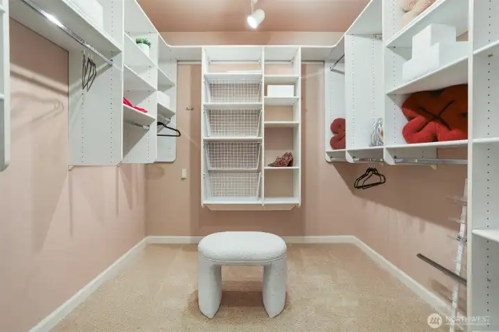 Enormous walk-in closet with convenient built-ins is also part of the primary suite.