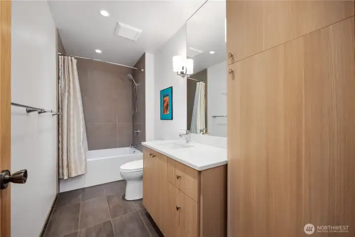 Guest Bath with large tub and stunning spa style.