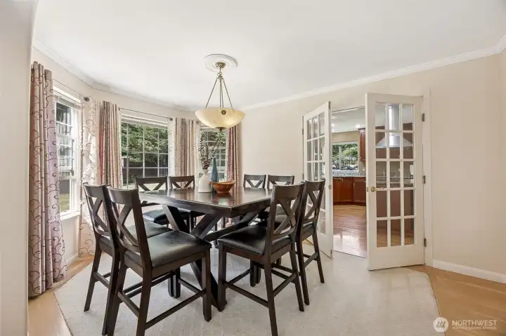 French doors close off the kitchen for a more private dinner venue.