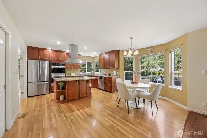A delightful breakfast nook is all set for morning coffee, snack time or your casual meals.