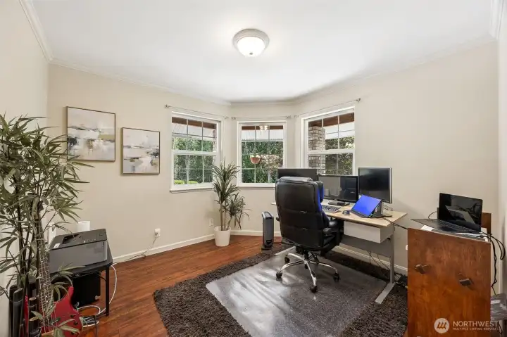 Enjoy working from home in the office/den offering a quiet and functional space designed with productivity in mind.