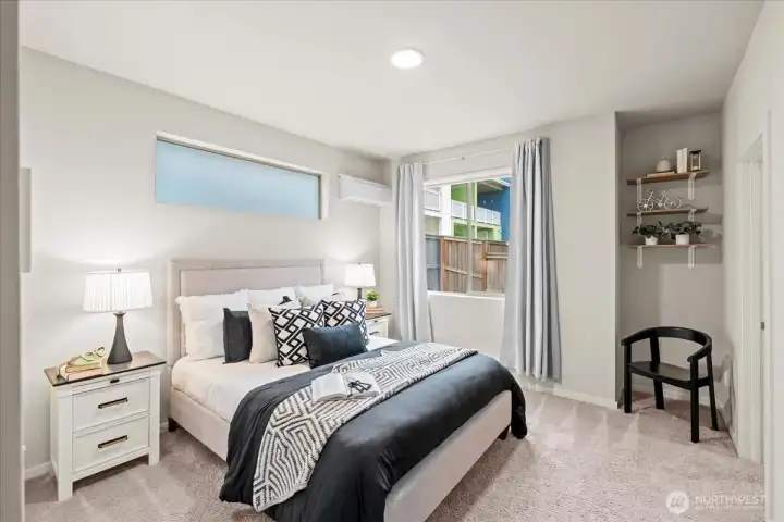 Bedroom suite downstairs with a functional layout and closet