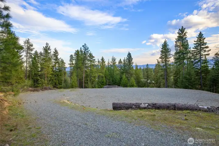 Midway down the driveway.