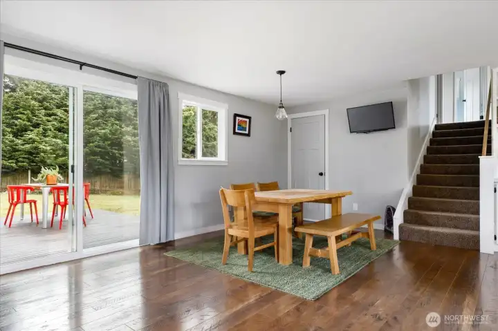 Dining area next to kitchen and back patio door. Dining area next to kitchen and back patio door.
