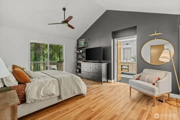 Primary bedroom w/ vaulted ceilings Primary bedroom w/ vaulted ceilings