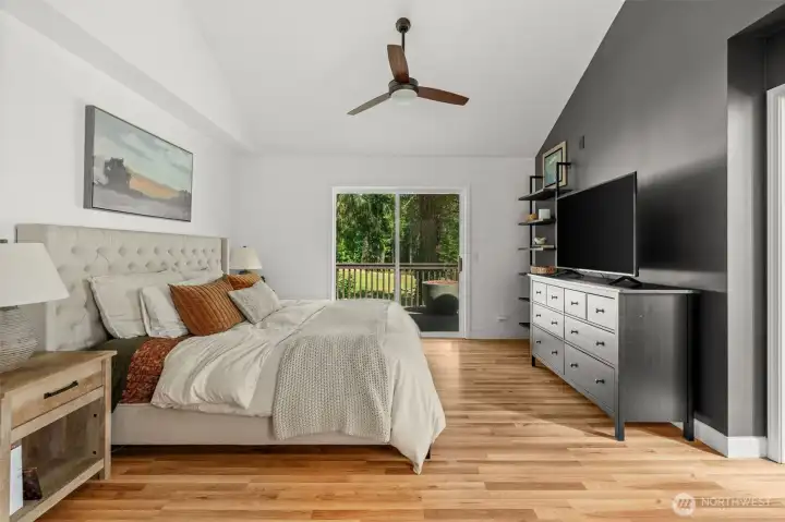 Primary bedroom w/ vaulted ceilings Primary bedroom w/ vaulted ceilings