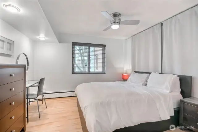 Bedroom with ceiling fan.