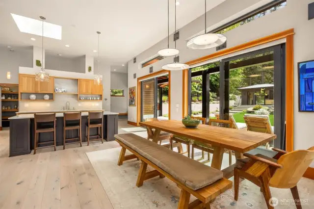 Looking toward the kitchen and front entry to the right.