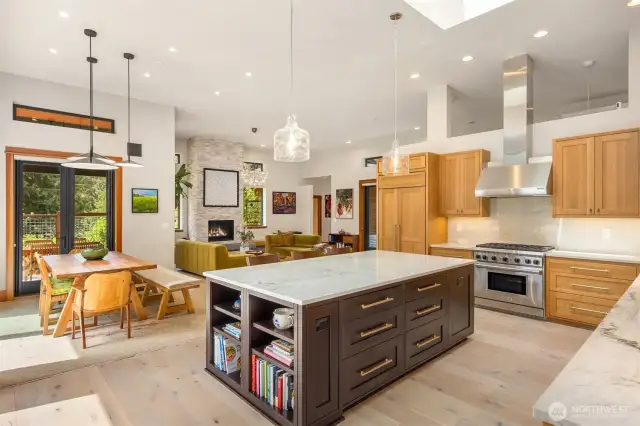 Wolf range, cooktop and hood fan. Stunning oak cabinetry.