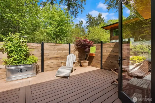 Private back deck off the primary suite.