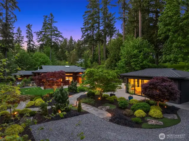 The grounds are beautifully landscaped with stone set pathways.