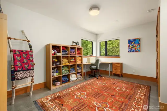 The northwest bedroom. The rooms in this wing of the home all have heated polished concrete floors.