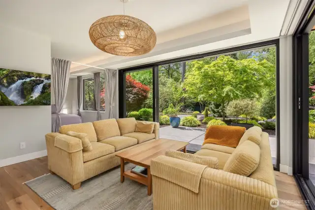 The guest suite is private and includes a kitchenette, living room space, sleeping area and 3/4 bathroom.