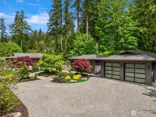 The driveway with two car garage.