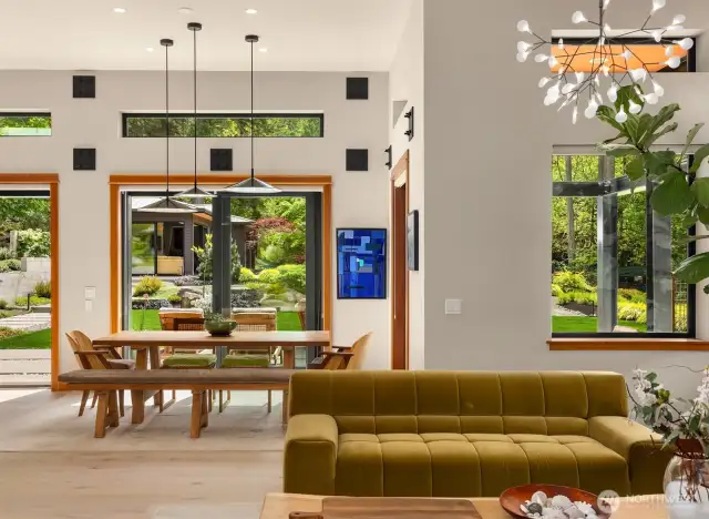 Designer lighting, clerestory windows and large doors to the outdoor spaces.