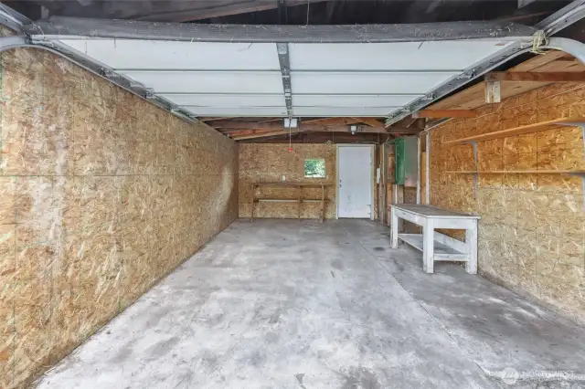 One car garage with added parking in front of entrance off of street. Equipped with garage door opener.