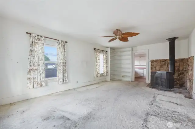 Main living room with wood fireplace
