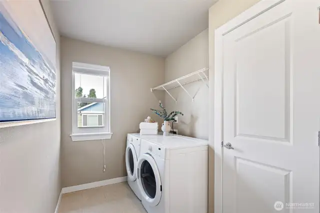 Enjoy the convenience of the extra large laundry/utility room with bonus storage closet!