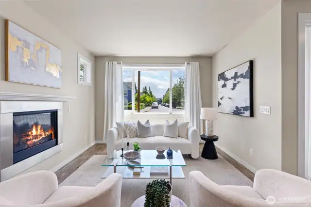 Tons of light with a view of the tree-lined street!