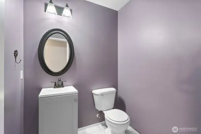 Half bath with vanity storage.