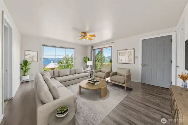 Virtually staged to showcase its potential, this living room provides a comfortable gathering space with breathtaking lake views right from your sofa. (Virtually Staged)