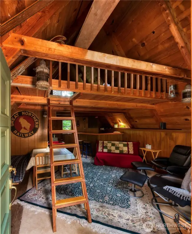 Warm, woodsy cabin interior w/loft.